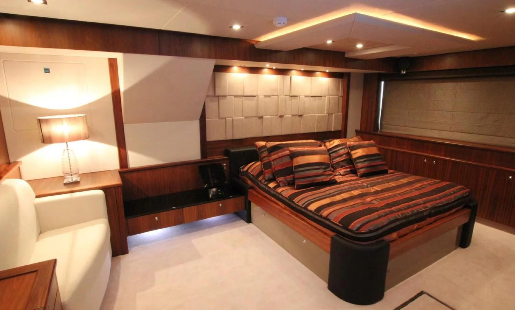 a room with a bed and a couch aboard ABRAHAM M Yacht for Sale