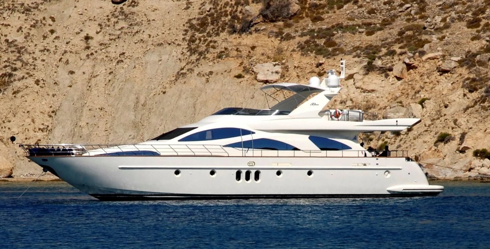a white yacht on the water aboard FREE SPIRIT Yacht for Sale