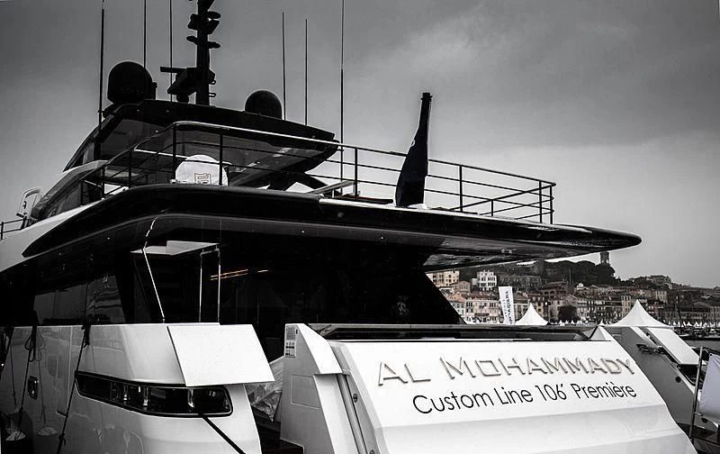 a black and white photo of a boat on a dock aboard FUNNY Yacht for Sale