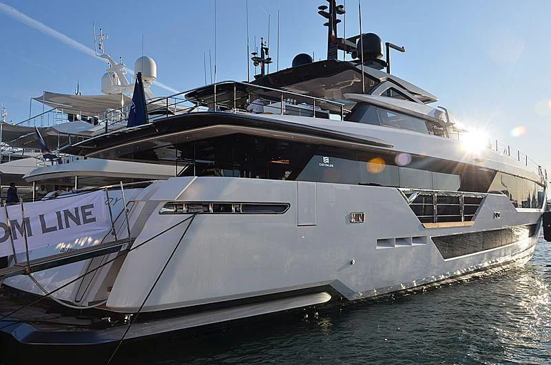 a couple of large yachts in the water aboard FUNNY Yacht for Sale