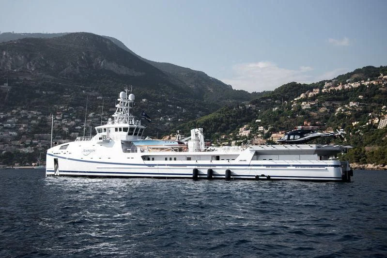 a large white boat in the water aboard GARCON Yacht for Sale