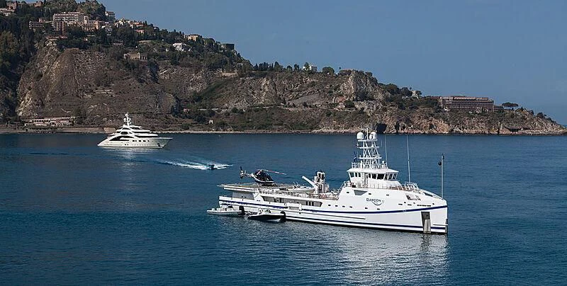 a couple of boats in the water aboard GARCON Yacht for Sale