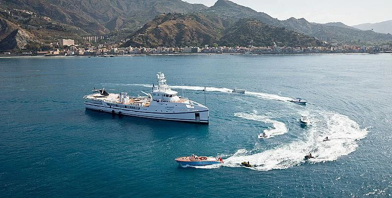 a boat and a boat in the water aboard GARCON Yacht for Sale