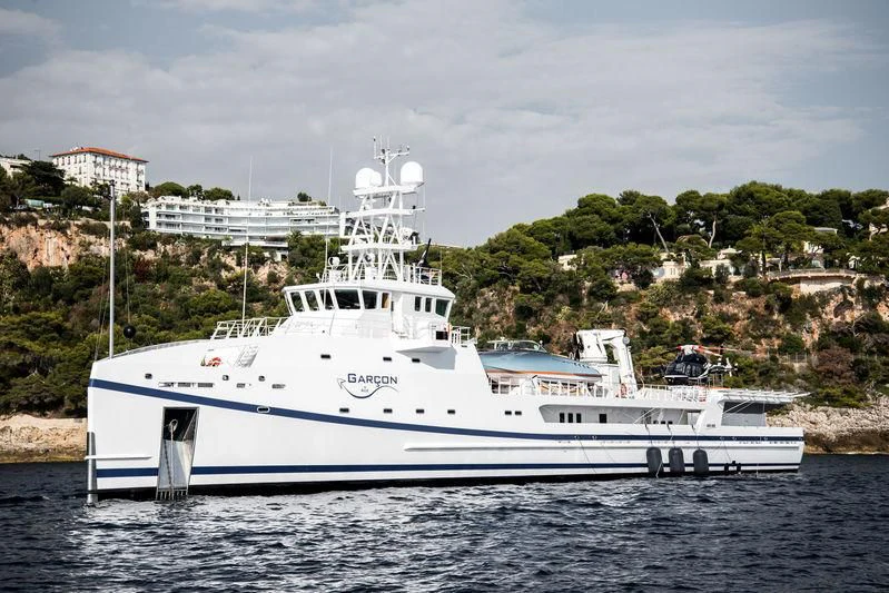 a white boat in the water aboard GARCON Yacht for Sale