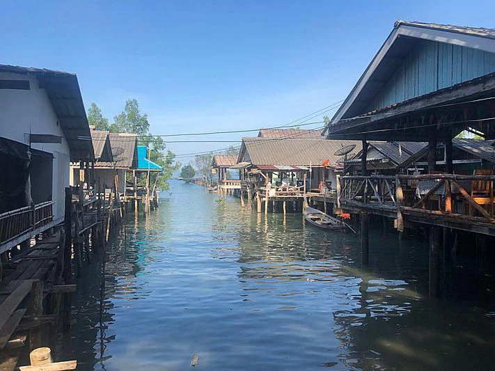 a body of water with buildings along it aboard GARCON Yacht for Sale