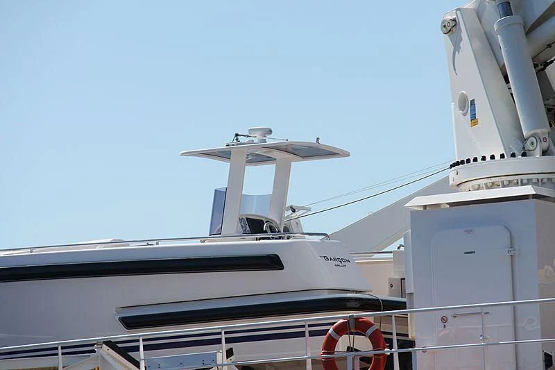 a white building with a satellite dish on top aboard GARCON Yacht for Sale