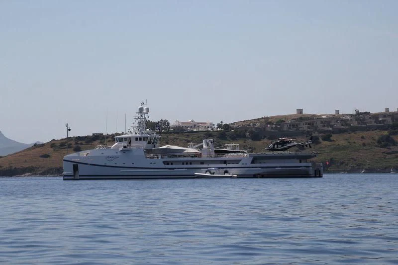 a couple of boats on the water aboard GARCON Yacht for Sale
