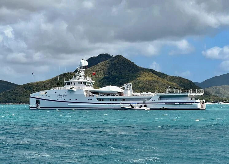 a couple of boats in the water aboard GARCON Yacht for Sale