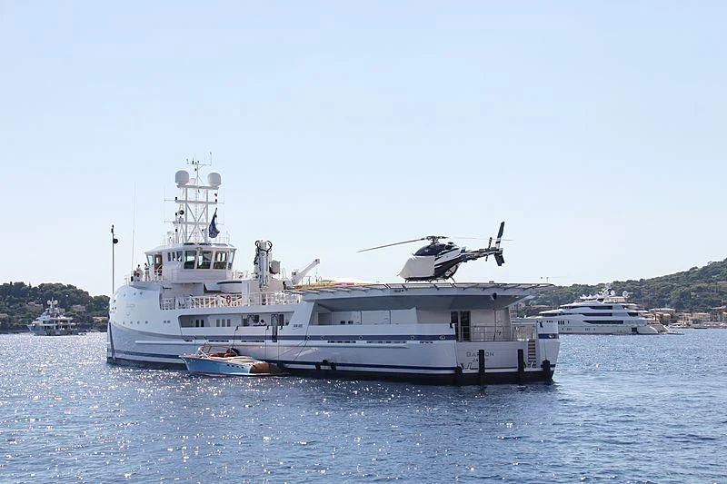 a large white boat in the water aboard GARCON Yacht for Sale