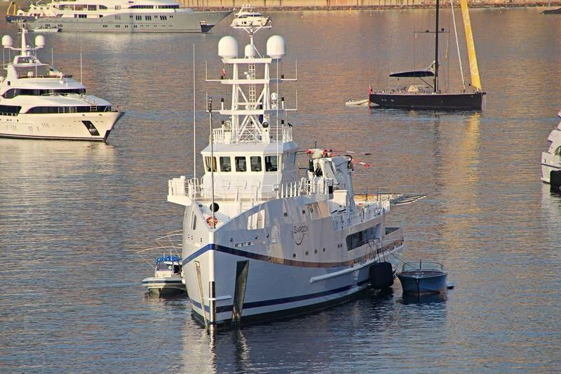 a large ship in the water aboard GARCON Yacht for Sale