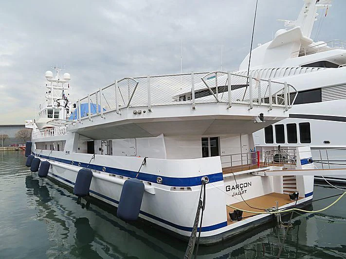 a large white boat aboard GARCON Yacht for Sale