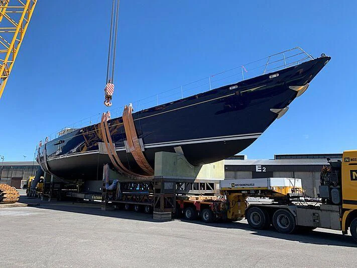a large airplane being loaded with cargo aboard CHRISTOPHER Yacht for Sale