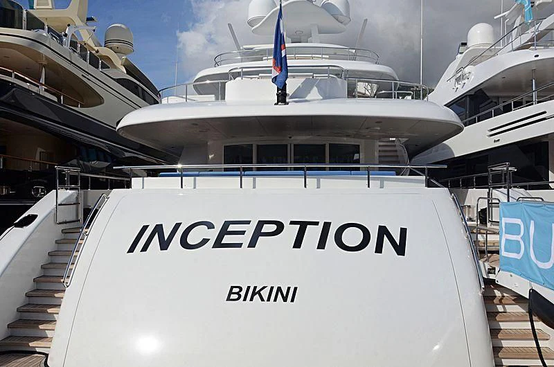 a white boat with black text on it aboard R JUNIORS Yacht for Sale