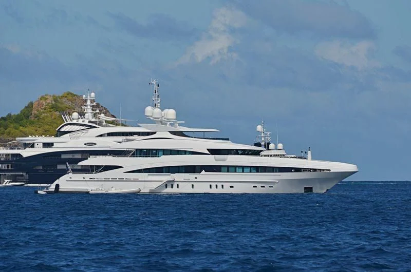 a large white ship in the water aboard R JUNIORS Yacht for Sale