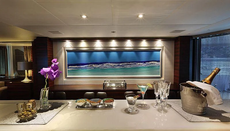 a table with food and drinks aboard R JUNIORS Yacht for Sale