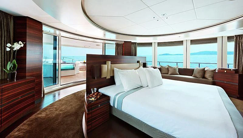 a bed in a room aboard R JUNIORS Yacht for Sale