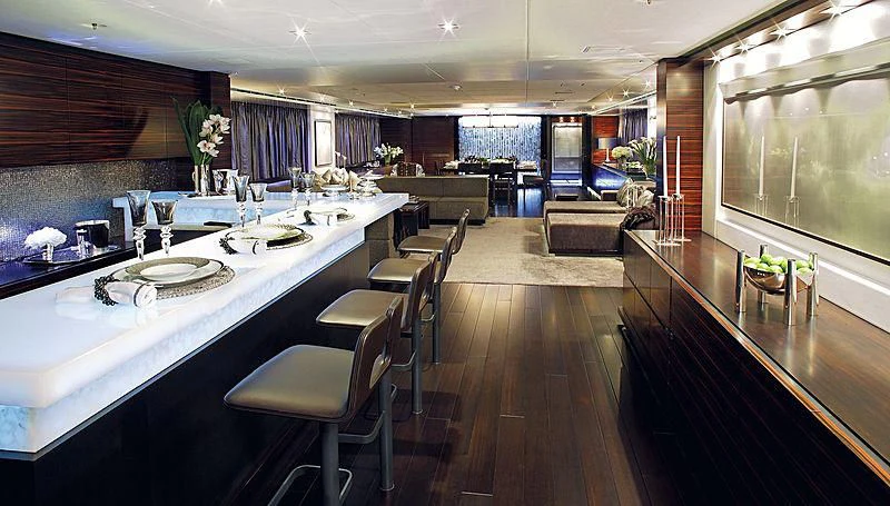 a large kitchen with a large table aboard R JUNIORS Yacht for Sale