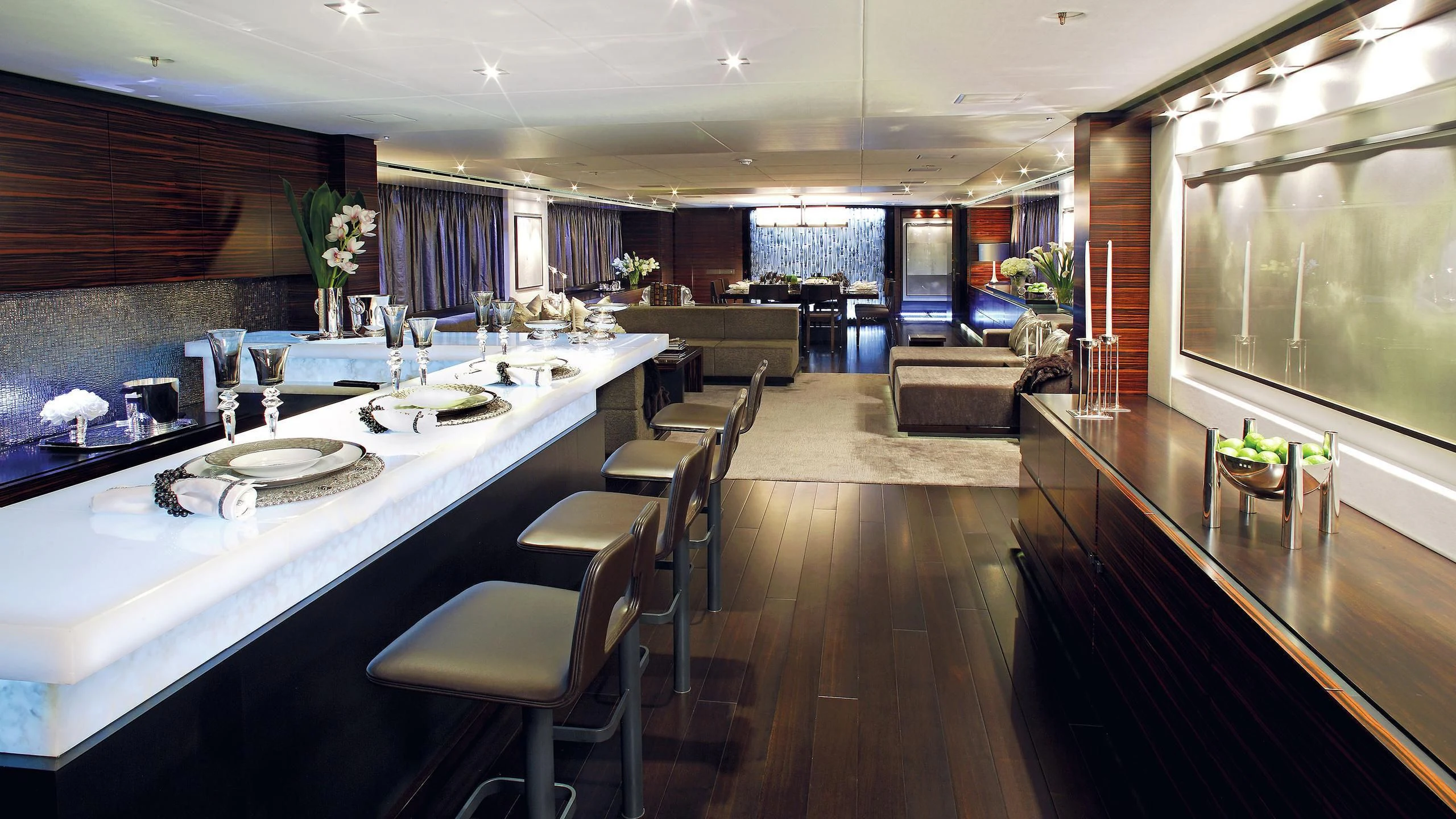 a large kitchen with a large dining table aboard R JUNIORS Yacht for Sale
