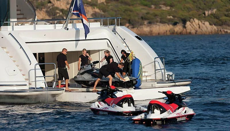 a group of people on a boat aboard R JUNIORS Yacht for Sale