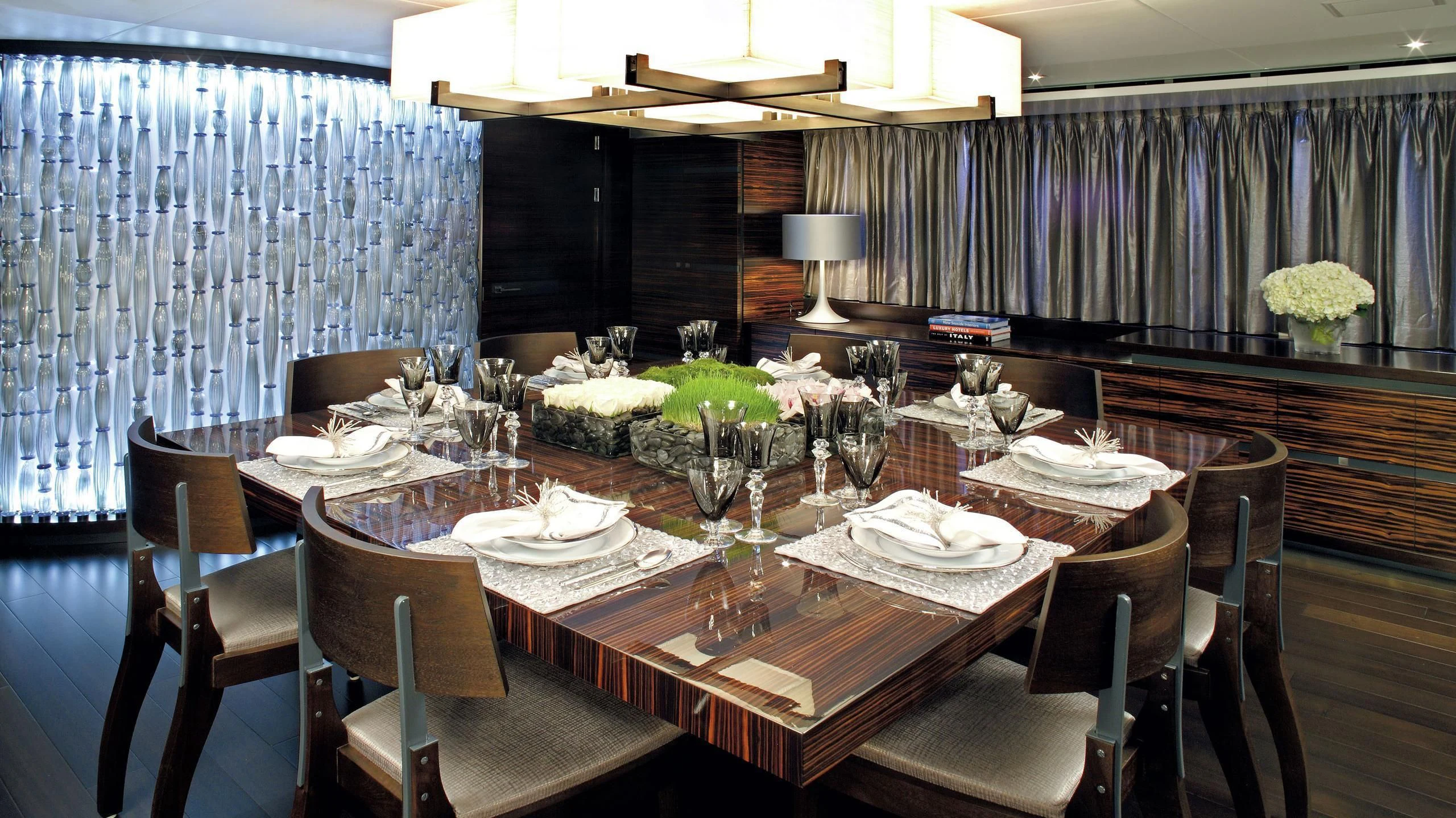 a dining table set for a dinner aboard R JUNIORS Yacht for Sale