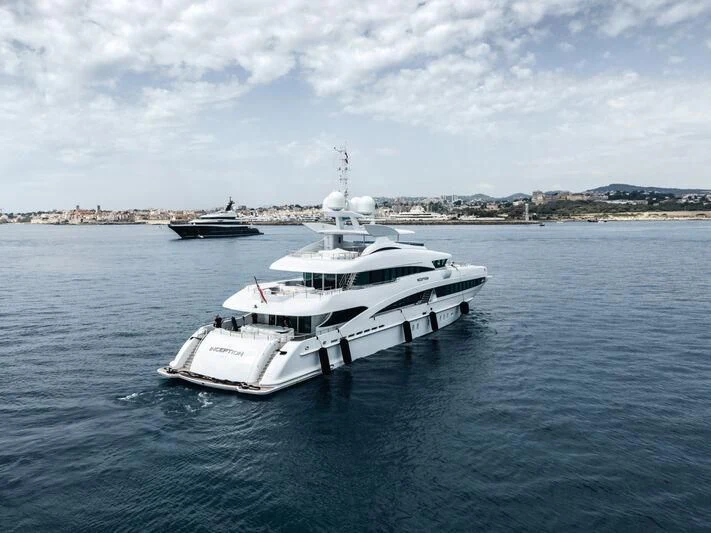 a white yacht in the water aboard R JUNIORS Yacht for Sale