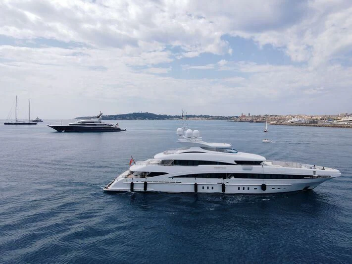 a white yacht in the water aboard R JUNIORS Yacht for Sale