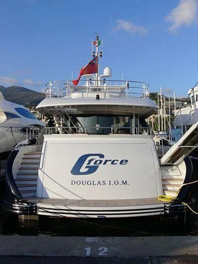 a boat docked at a pier aboard G-FORCE Yacht for Sale