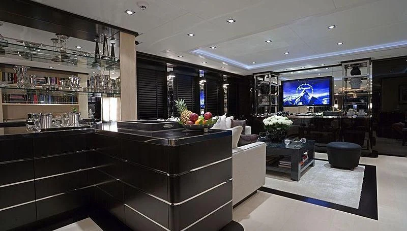a room with a tv and a counter aboard G-FORCE Yacht for Sale