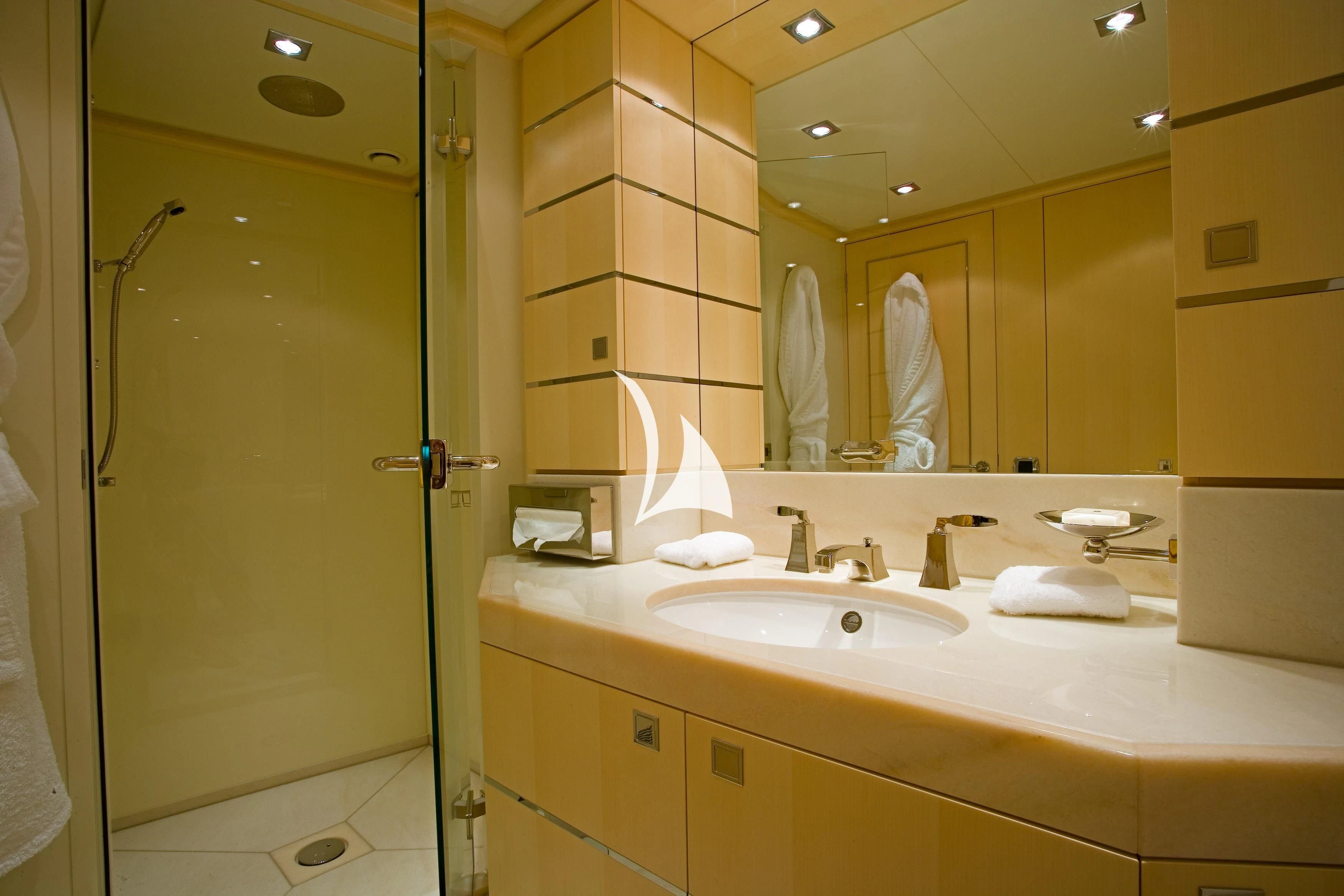 a bathroom with a large mirror aboard G-FORCE Yacht for Sale