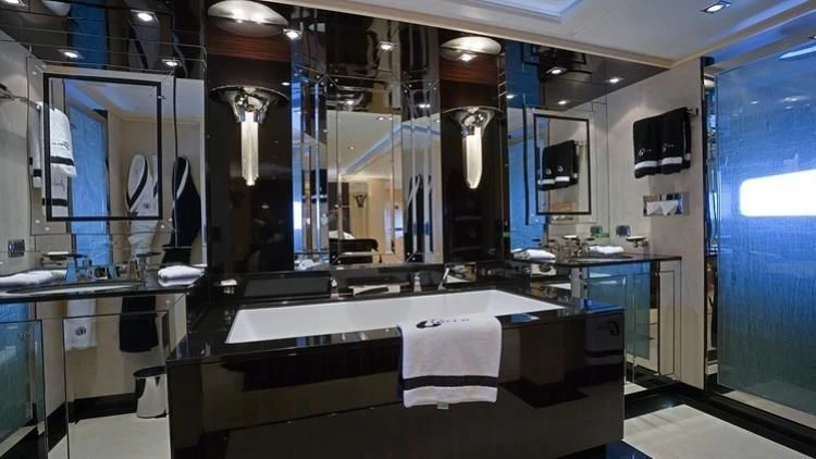 a room with a counter and sinks aboard G-FORCE Yacht for Sale