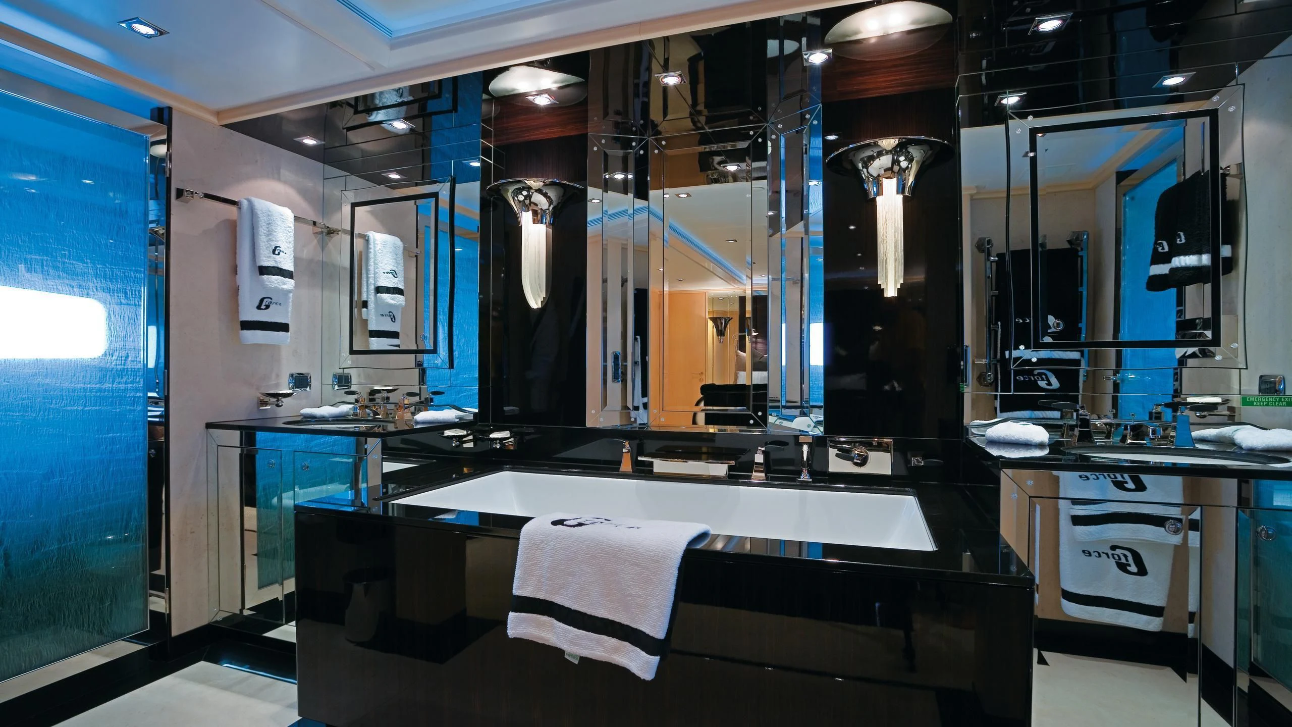 a room with a counter and sinks aboard G-FORCE Yacht for Sale