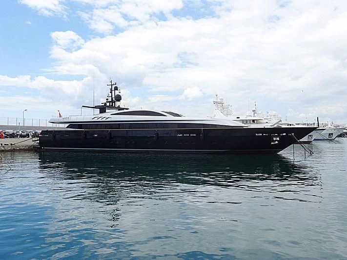 a large ship in the water aboard FAN TOO Yacht for Sale