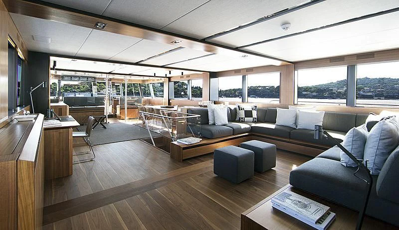 a living room with a large window aboard KANGA Yacht for Sale