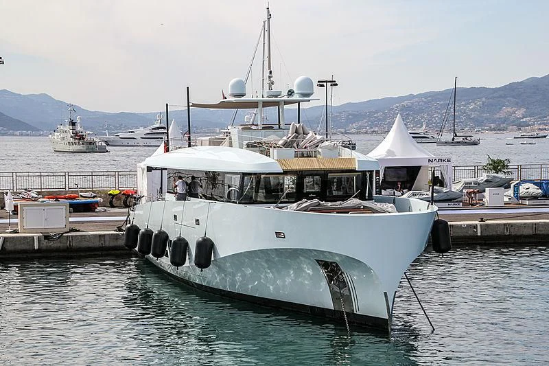 a boat is parked at a dock aboard KANGA Yacht for Sale