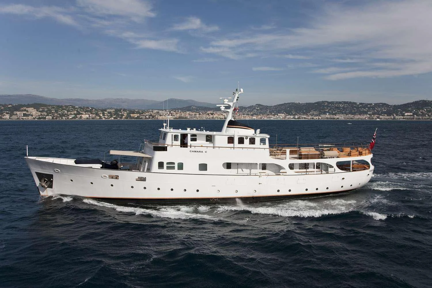 a large white boat in the water aboard CAMARA C Yacht for Sale