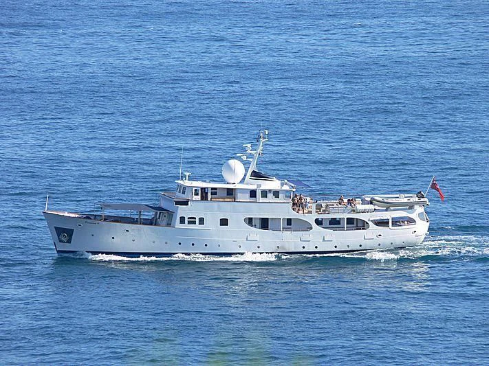 a couple of white yachts in the ocean aboard CAMARA C Yacht for Sale