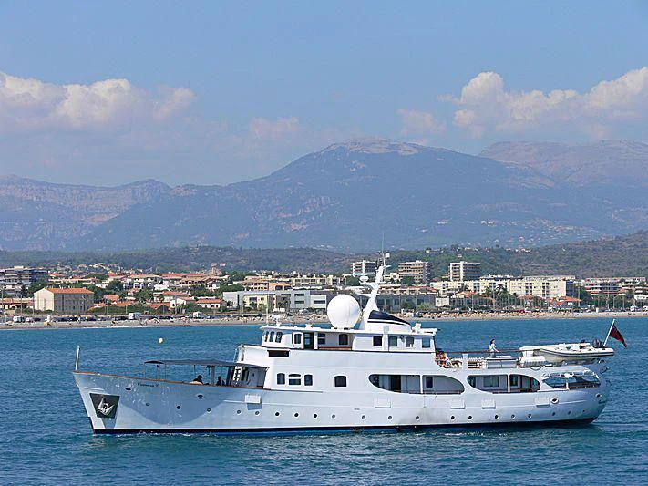 a couple of boats sit in a harbor aboard CAMARA C Yacht for Sale