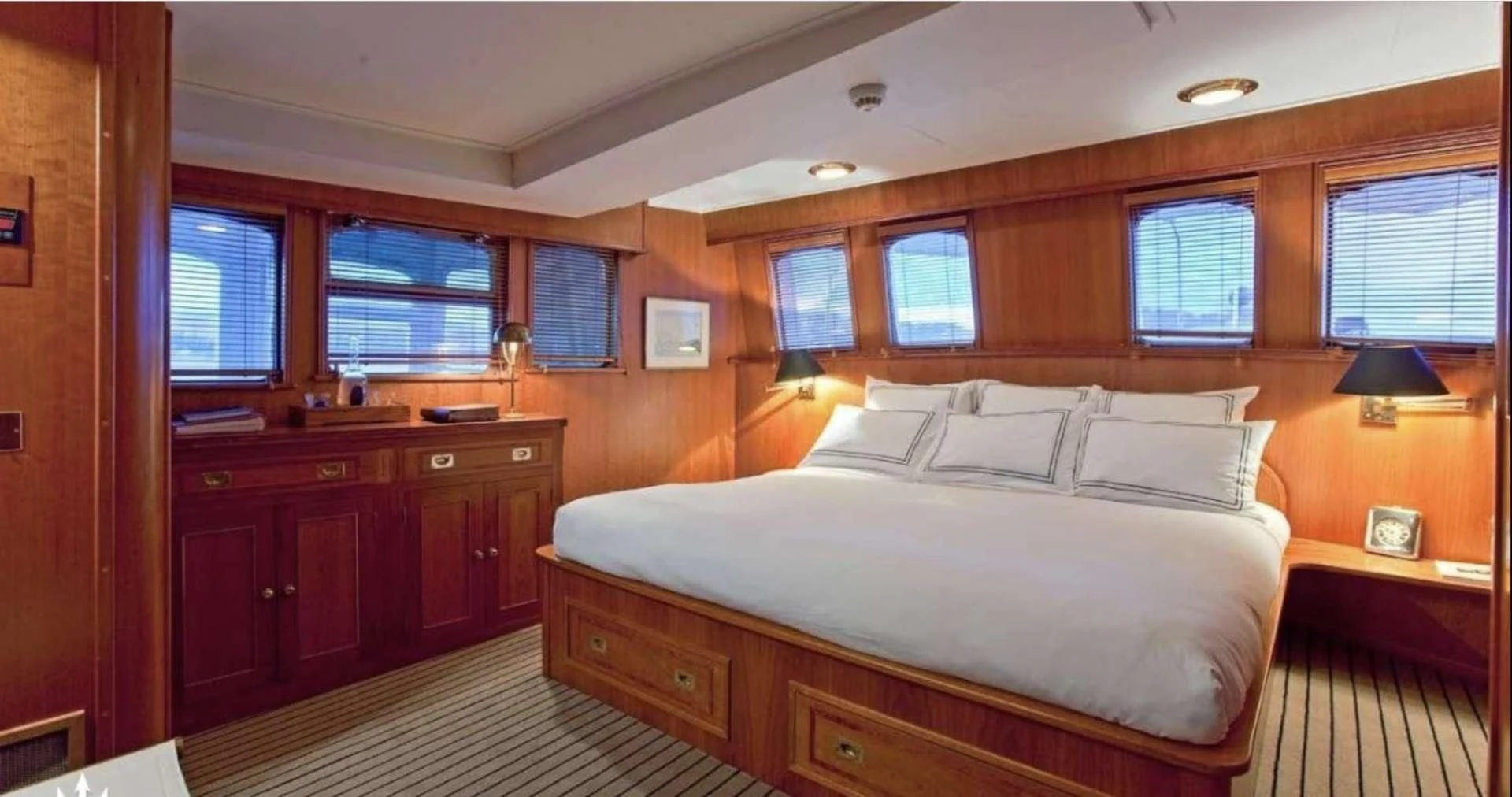 a bedroom with a large bed aboard CAMARA C Yacht for Sale