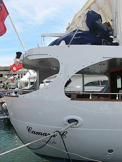 a boat with a helicopter on it aboard CAMARA C Yacht for Sale