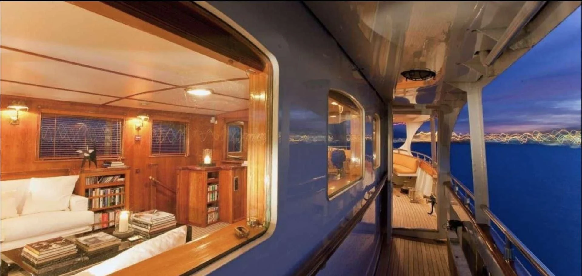 a room with a bed and a blue tent aboard CAMARA C Yacht for Sale
