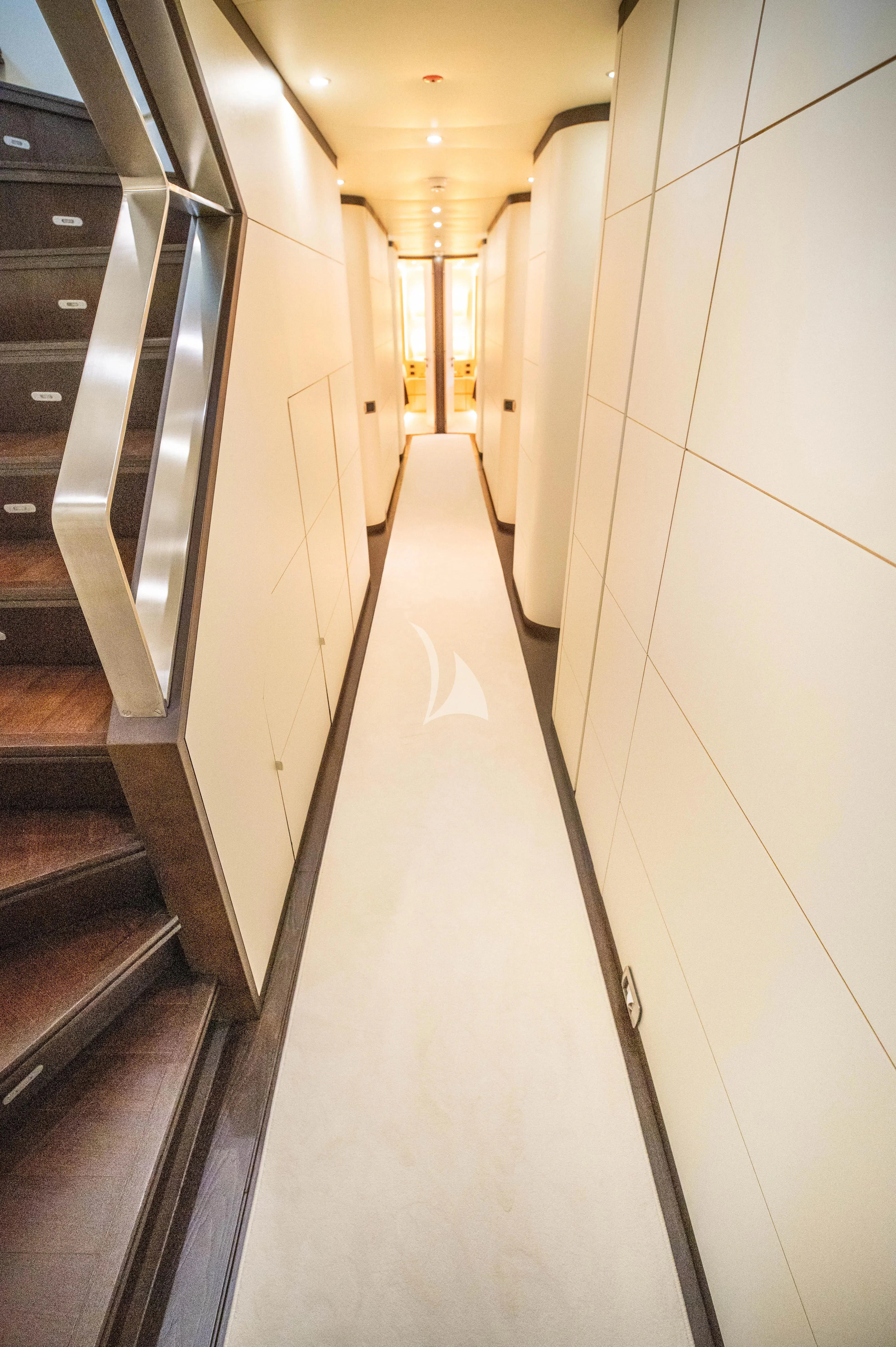 a hallway with doors aboard PAREAKI II Yacht for Sale