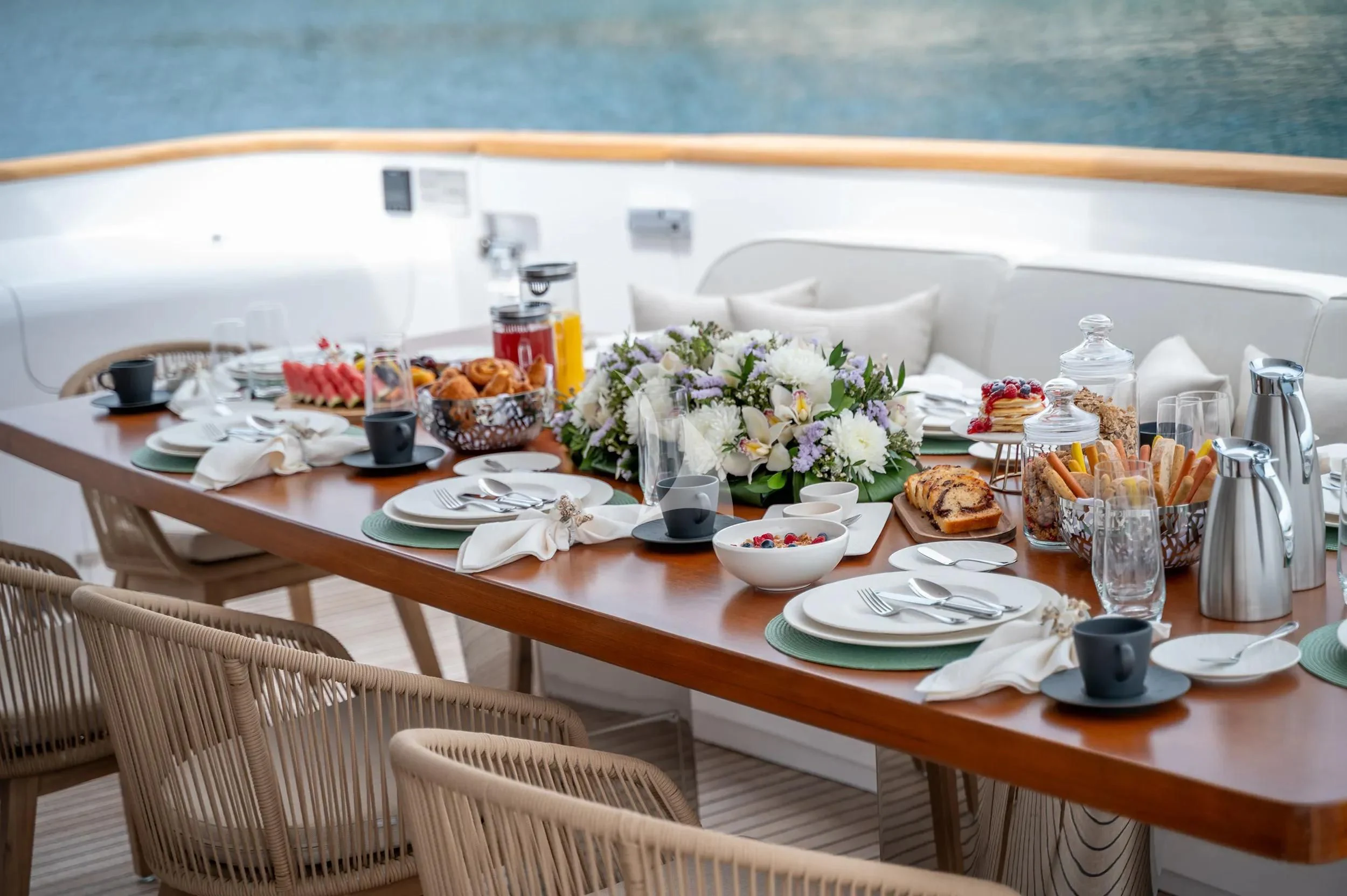 a table with food on it aboard PAREAKI II Yacht for Sale