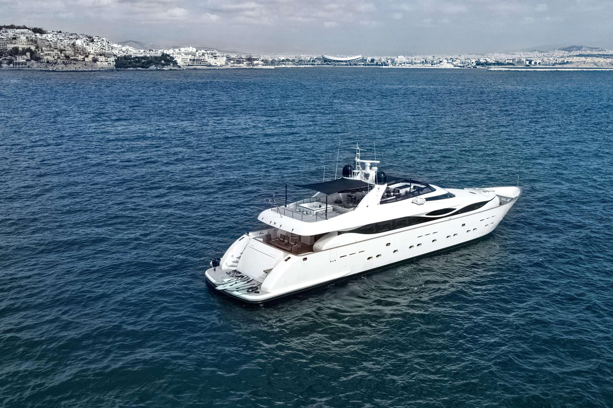 a white boat in the water aboard PAREAKI II Yacht for Sale