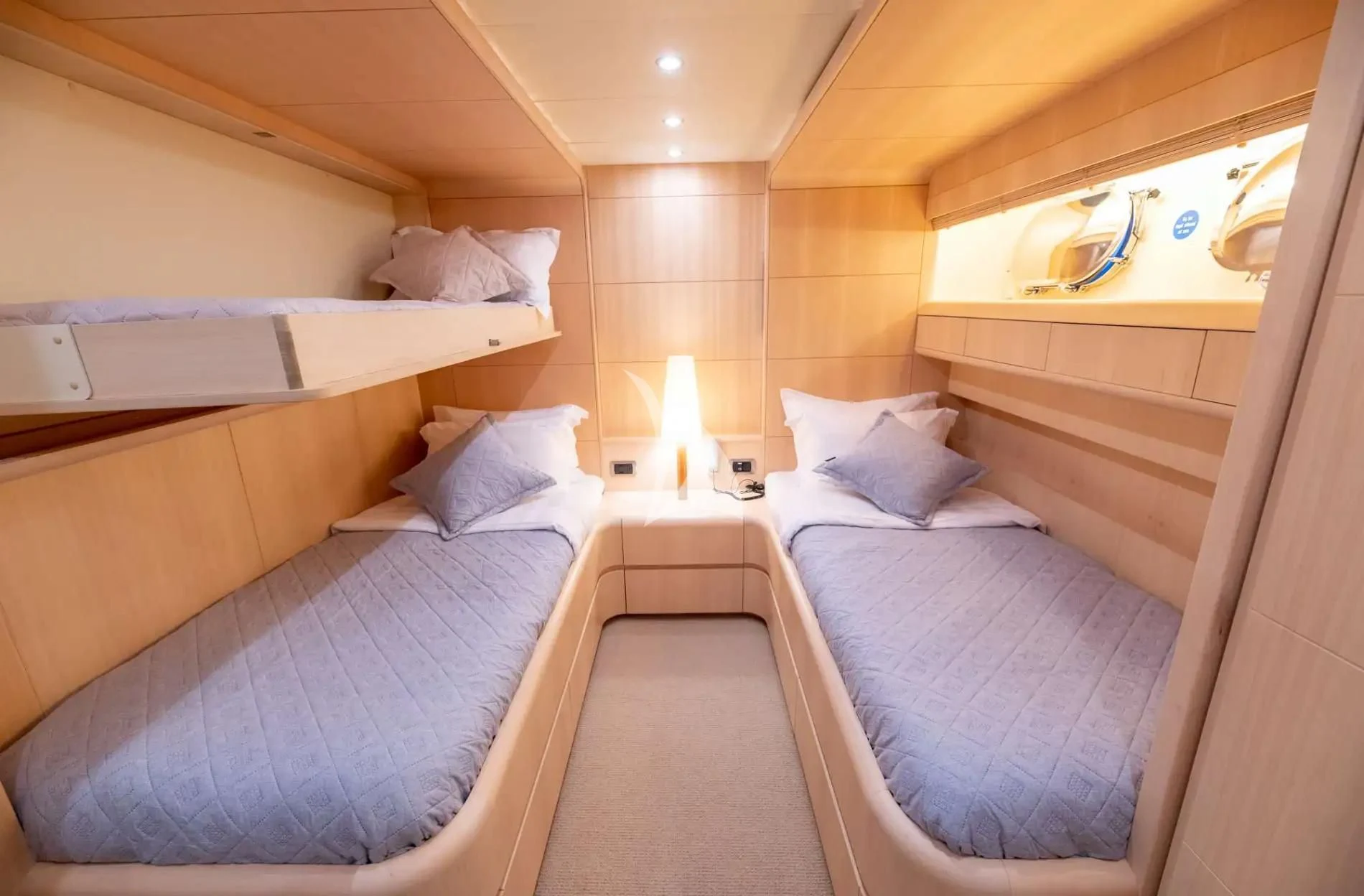 a room with two beds aboard PAREAKI II Yacht for Sale