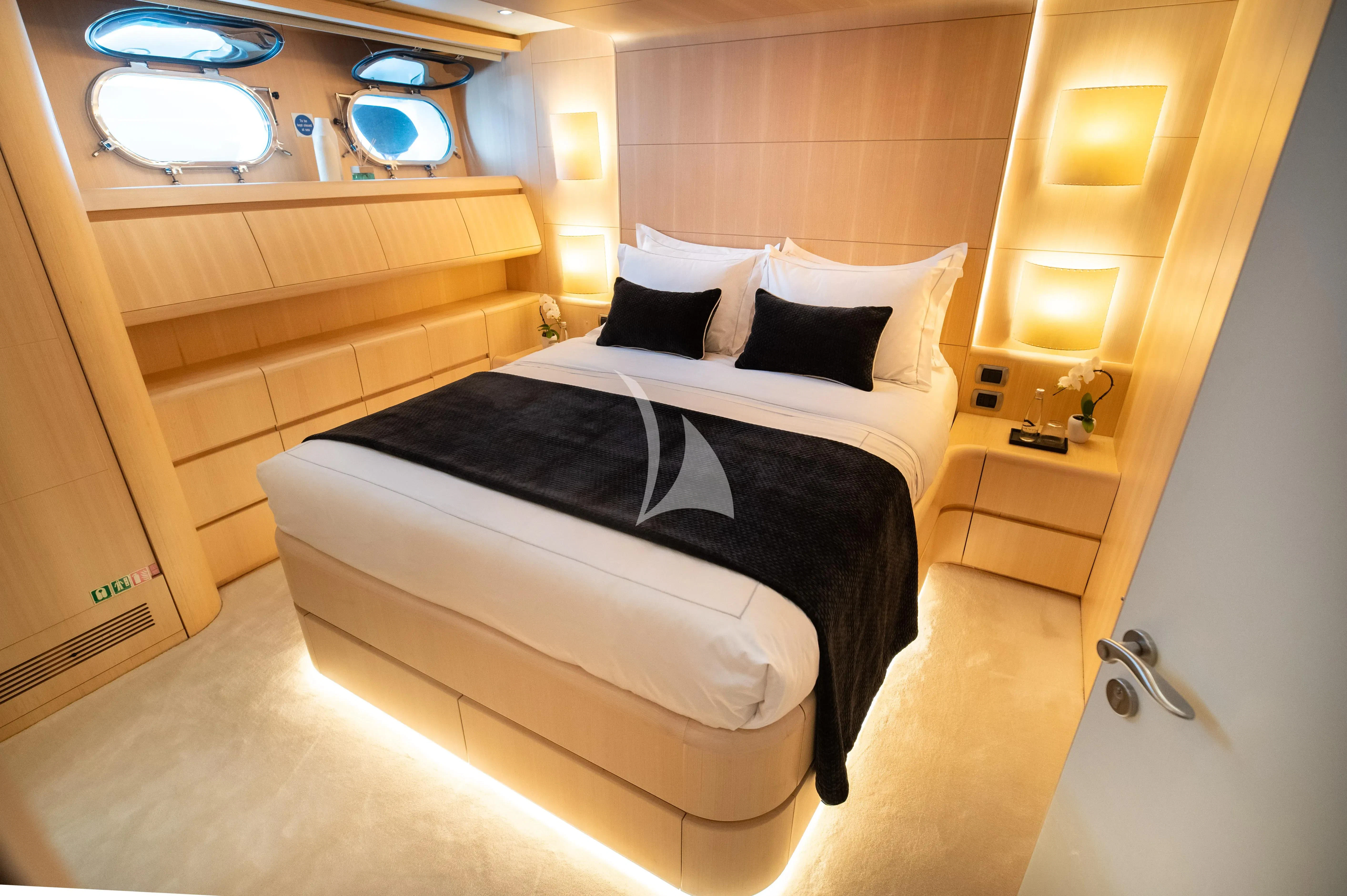a bed in a room aboard PAREAKI II Yacht for Sale