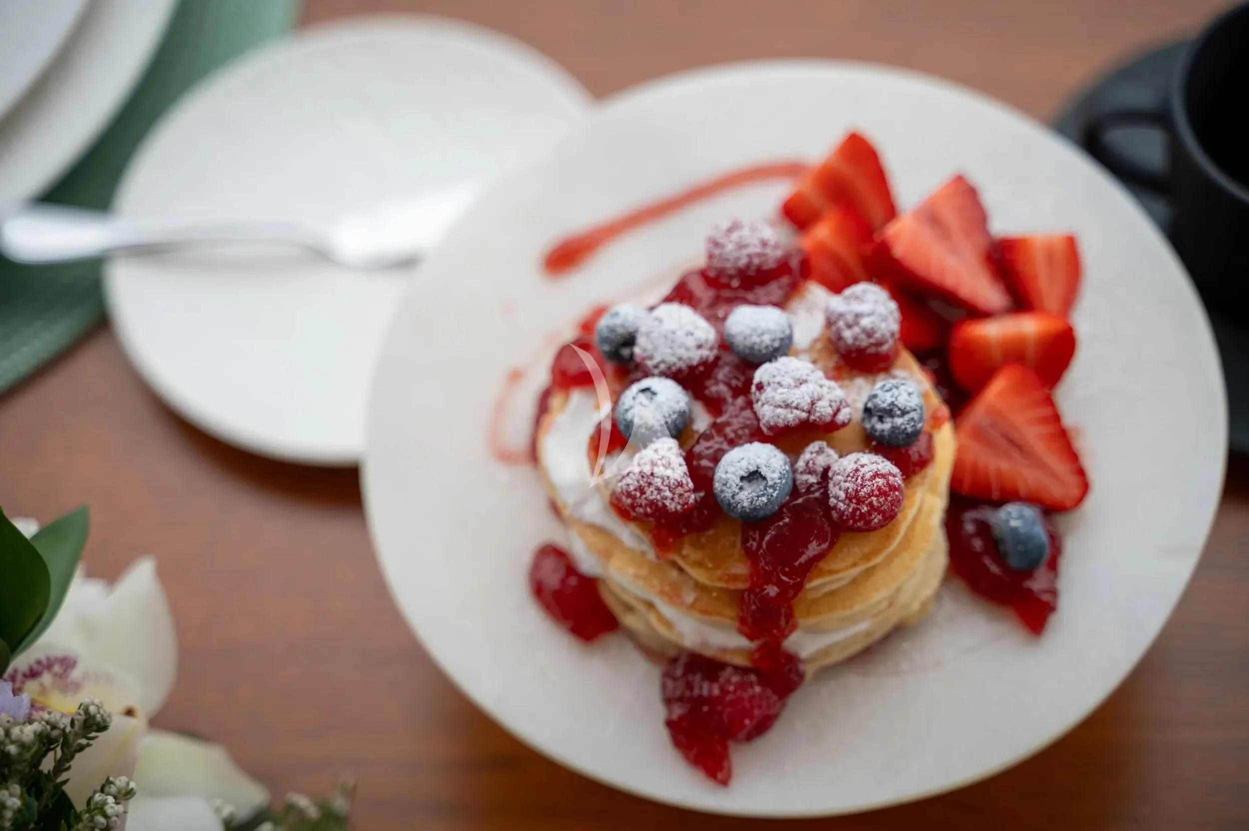 a plate of food aboard PAREAKI II Yacht for Sale