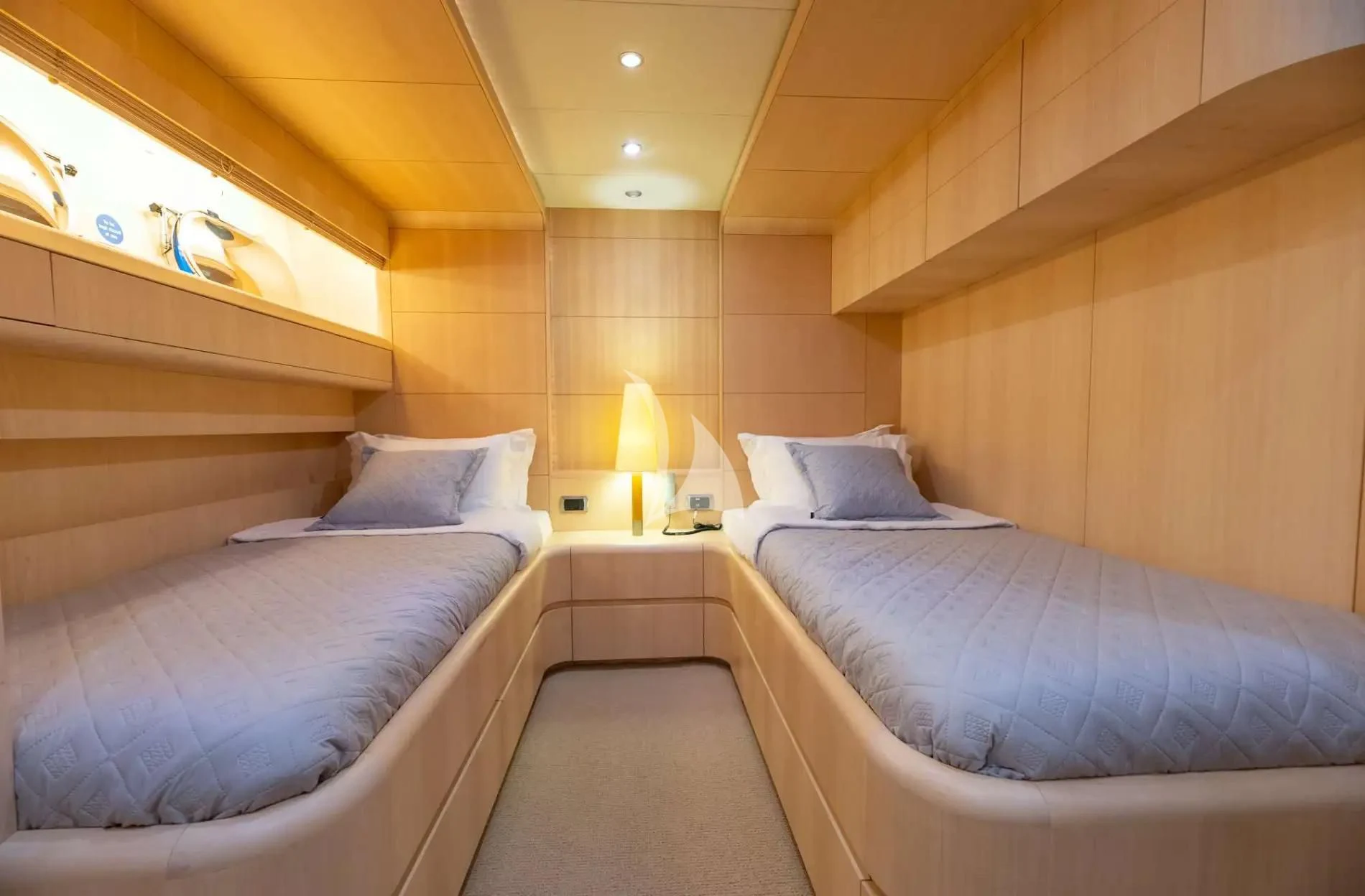 a room with two beds aboard PAREAKI II Yacht for Sale