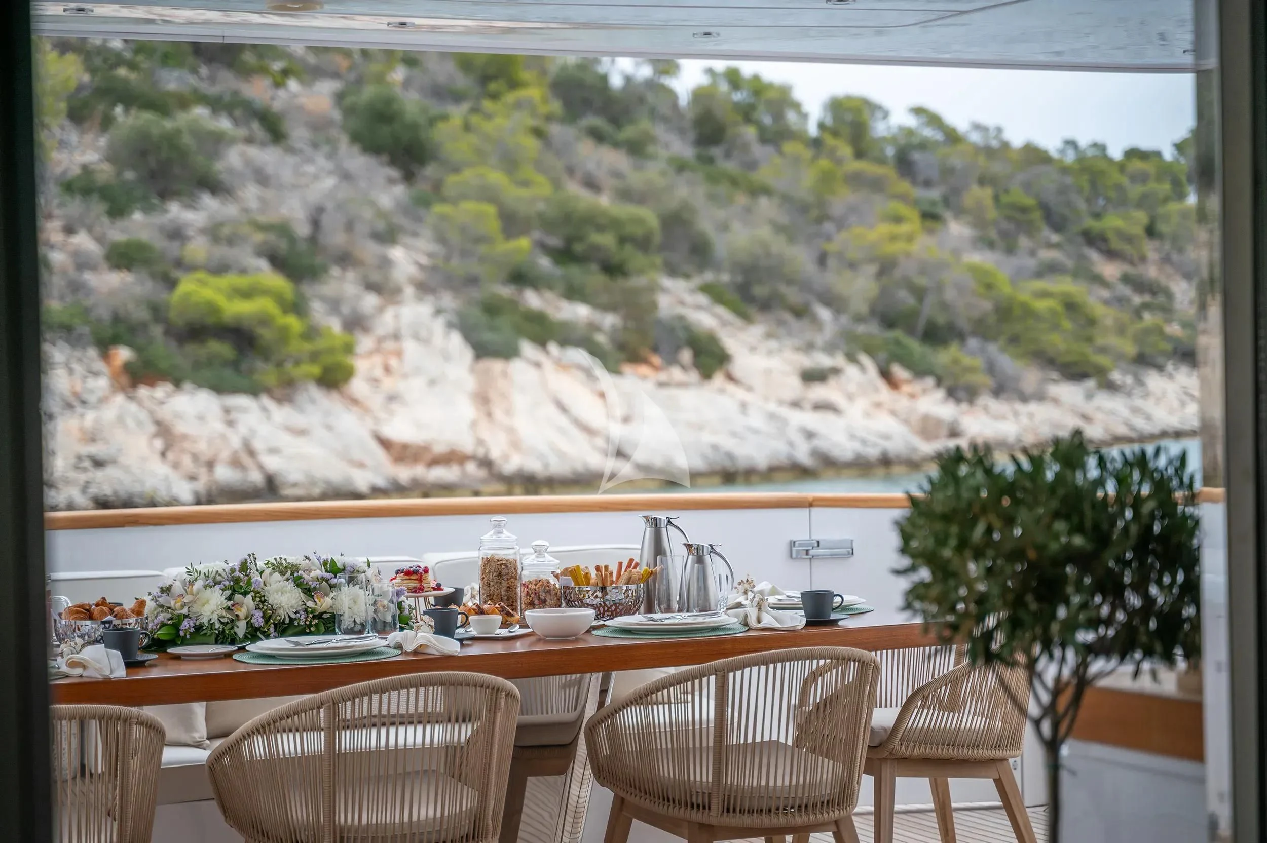 a table with food on it aboard PAREAKI II Yacht for Sale