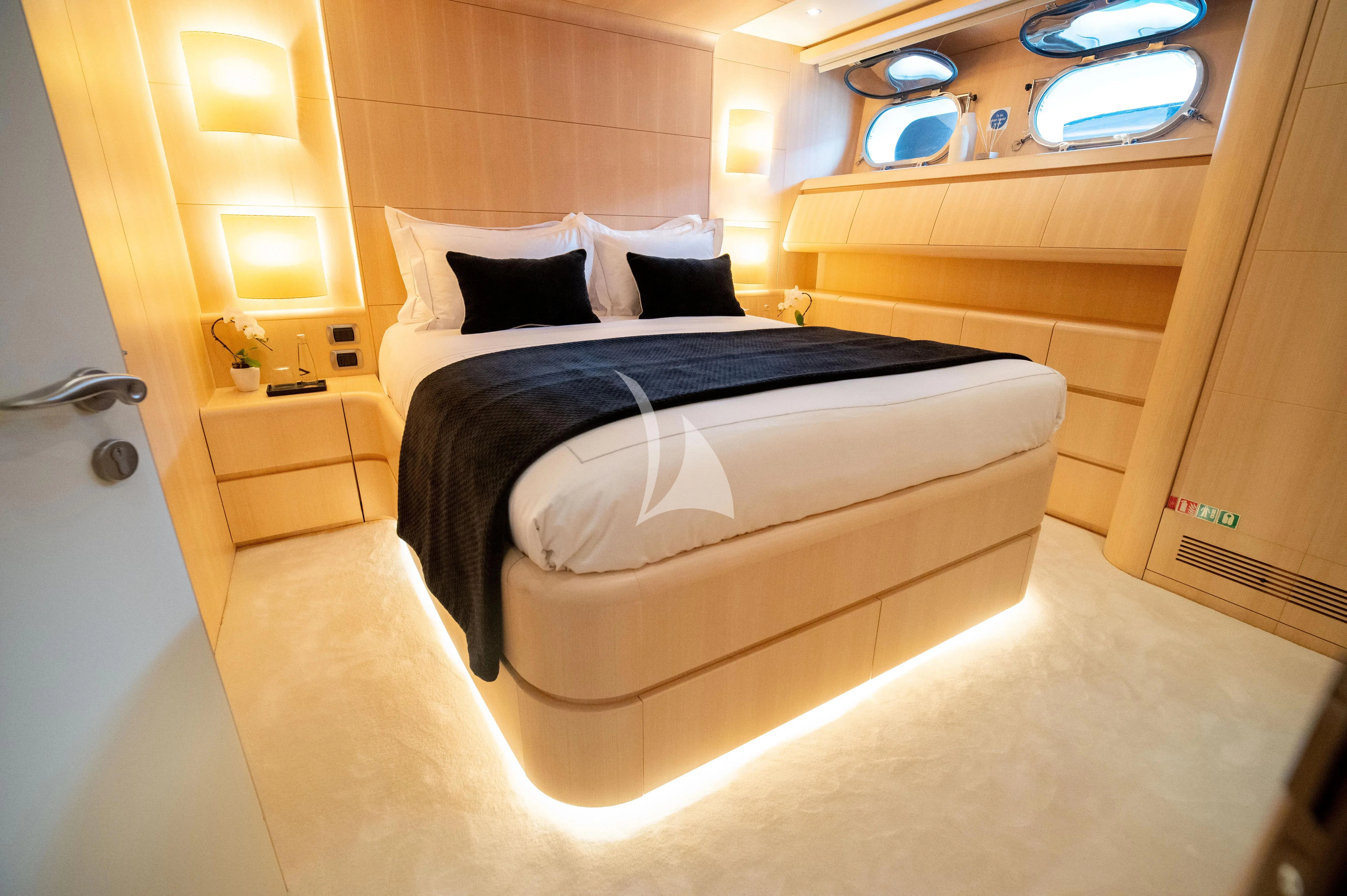 a bed in a room aboard PAREAKI II Yacht for Sale