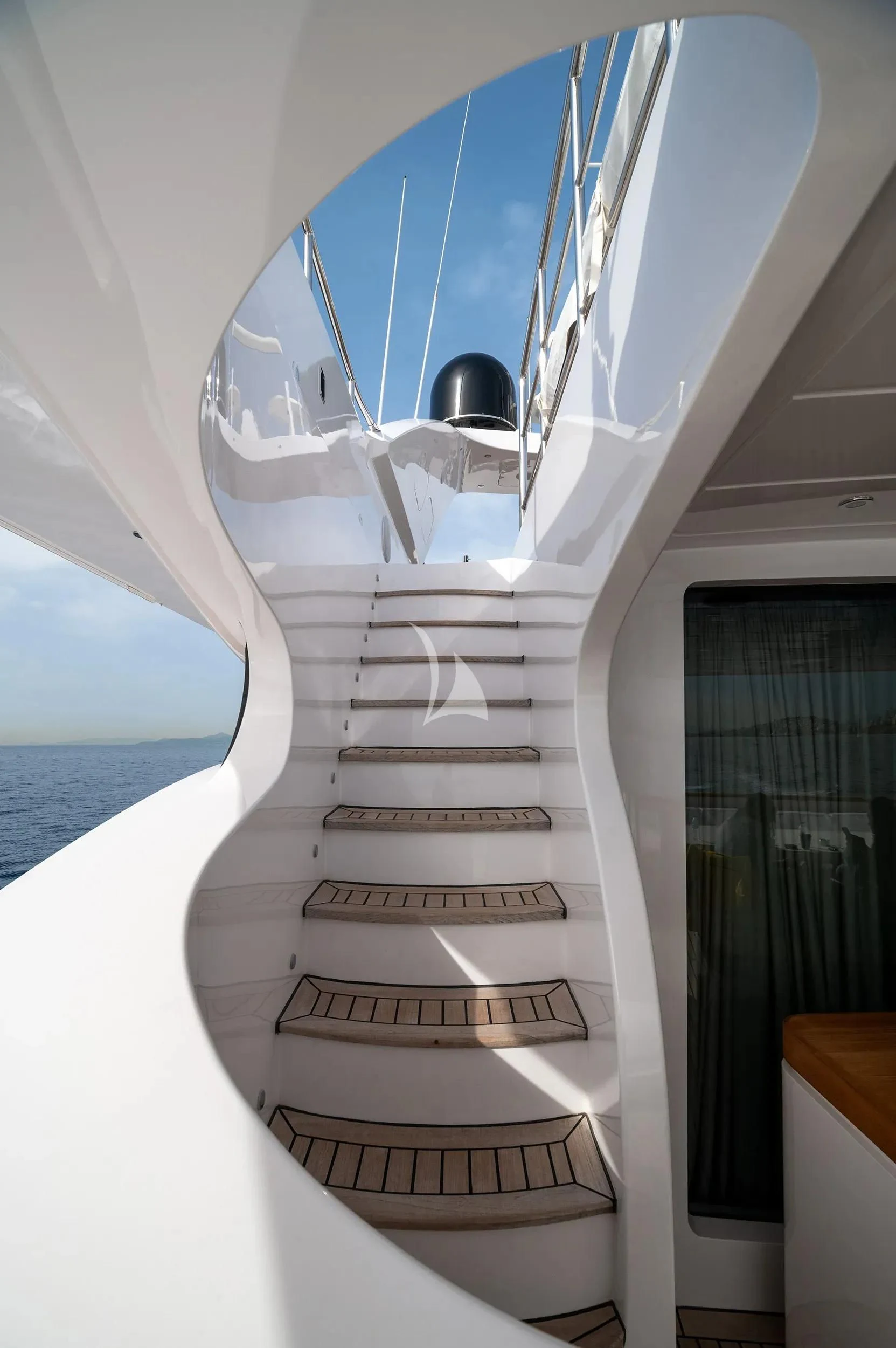 a white staircase with a glass ceiling aboard PAREAKI II Yacht for Sale